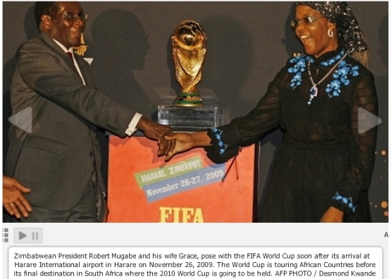 President Mugabe and his wife Grace pose with the FIFA World Cup, November 26 ,2009